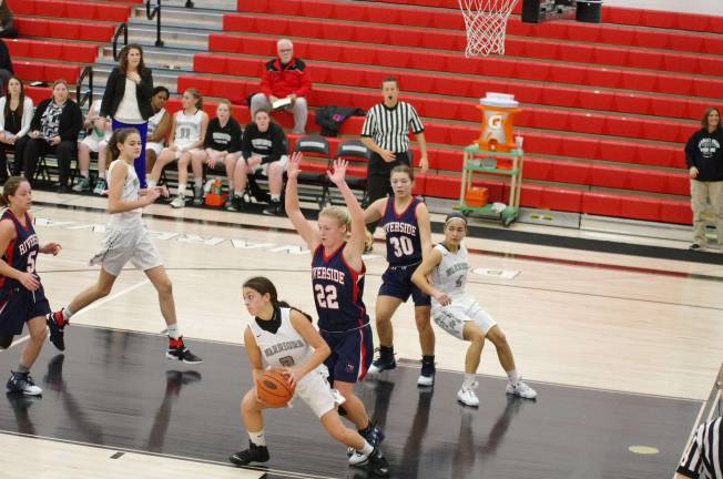 Delaware Valley’s Jenna Pacella holds the ball while covered by Riverside’s Lizzy Spindler