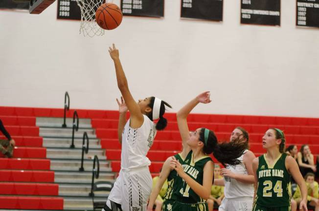 Delaware Valley Warrior Ciera Cavallaro releases the ball during a shot. Cavallaro scored ten points.