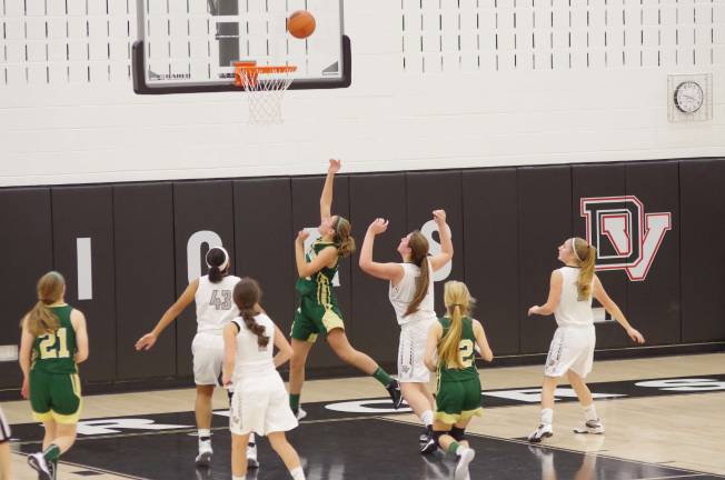 A Notre Dame Spartan performs a layup.
