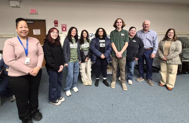 From left: Pike County Commissioner Christa Caceres, Gopher Gold team members Ruby Bailor, Ella Dong, Daisy Olivo Heller, Andria Prime, and Jackson Hancock, Gopher Gold advisor Bernadine Salak, Pike County Commissioner Ron Schmalzle, and Wayne County Commissioner Jocelyn Cramer.