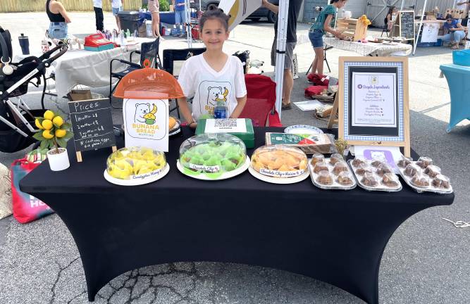 A young entrepreneur at the 2025 fair.