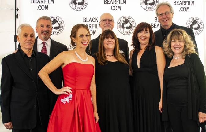 The festival board (from left): Jerry Weinstock, Tim Smith, Michelle Marquis, Darrell Berger, Susan Sanchez-Fontaine, Veronica Coyne, Max Brinson, and Renee Hoover