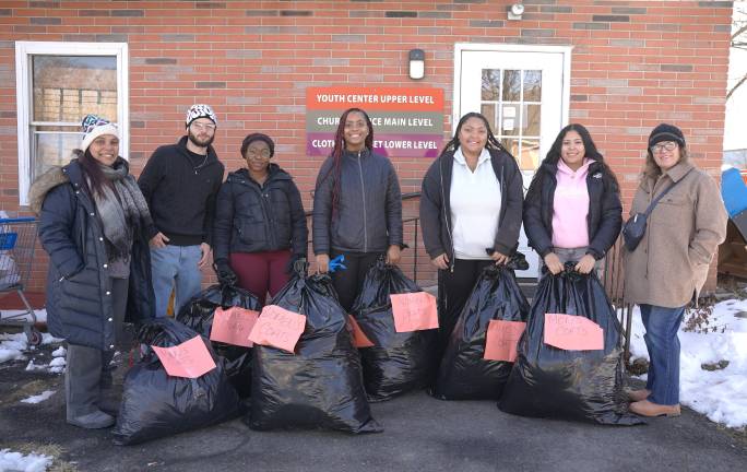 From left: Aida Garcia-Cole, assistant registrar for graduation services and MANA advisor, Cinnsire Warner, Dynasia Speaks, Oliana Cole, Olivia Cole, Arianna Gonzalez, and Laura Kieselbach, associate professor of English.