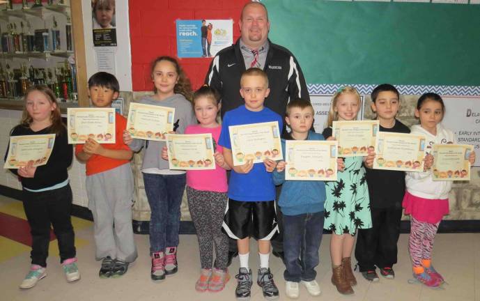 Second Grade Students of the Month: Gabriella Fatigati, Shin-Kook Moon, Aaliyah Eichler, Lauren Ford, Colin Mulligan, Keegan Johnson, Alivia Wieder, Nathanial Elabdouni and Irene McDermott with DVES Principal Aaron Weston.