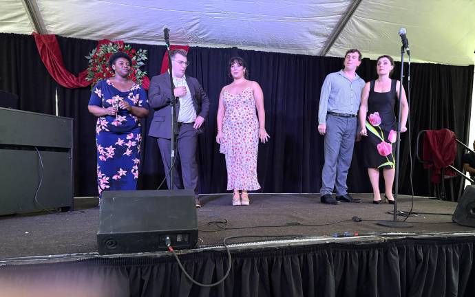 Left to right: Soprano Jasmine Rose, Tenor Ryan Michi, Mezzo-Soprano Maiya Williams, Bass-Baritone Dylan Gregg, and Soprano Emily Margevich.