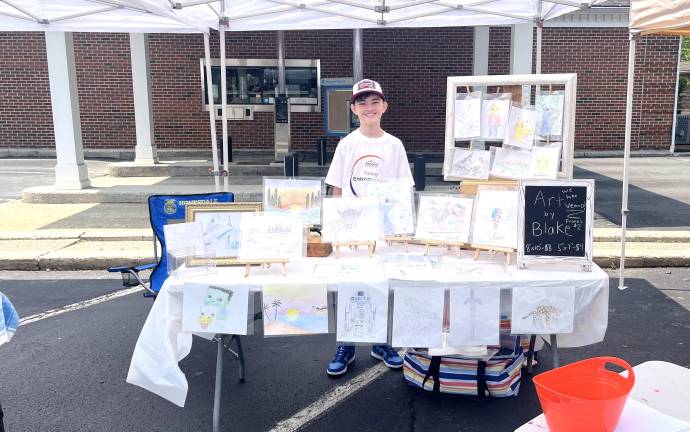 A young entrepreneur at the 2025 fair.