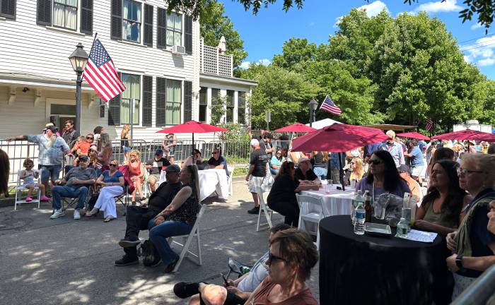 Guests enjoy Milford Hospitality’s food, games and car show on Catharine Street.