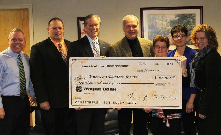 Pictured (from left): John Bell, Delaware Valley Superintendent of Schools; Derek Bellinger, Wayne Bank Assistant Vice President, Pike County Commercial Loan Officer; Lewis J. Critelli, Wayne Bank President and Chief Executive Officer; Jeffrey Stocker, Director of the American Readers Theatre, MaryAlice Petzinger, Wayne Bank Vice President, Milford Community Office Manager and Pike County Regional Manager; Gina Vives, Delaware Valley Director of Curriculum and Technology; and Peg Schaffer, Delaware Valley Director of Elementary Education. (Photo provided)
