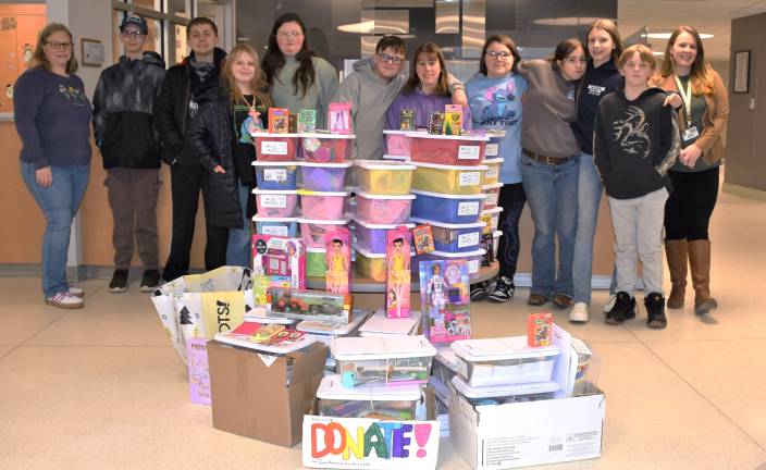 Wayne Highlands 6-8 graders, Jessica Kjera, youth programs and pop-up club coordinator at The Cooperage Project, (center) ,WMH Cashier Heather Gustafson, and Wayne Memorial Hospitals Human Resources Generalist Courtney Eichensehr<b>.</b>