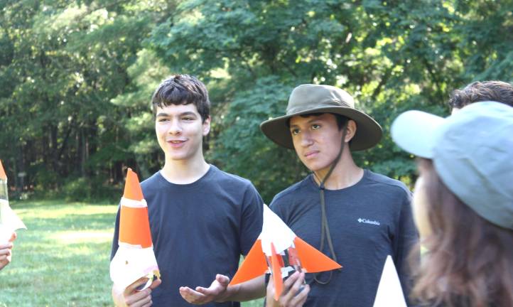 PEEC counselors lead a STEM activity with campers.