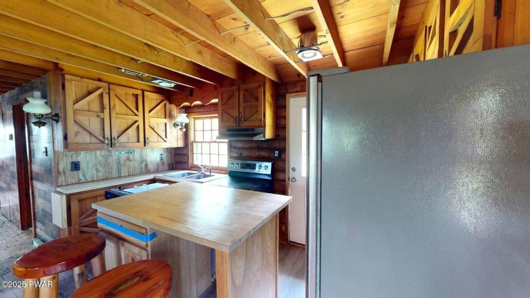 Riverfront Log Cabin with Endless Potential