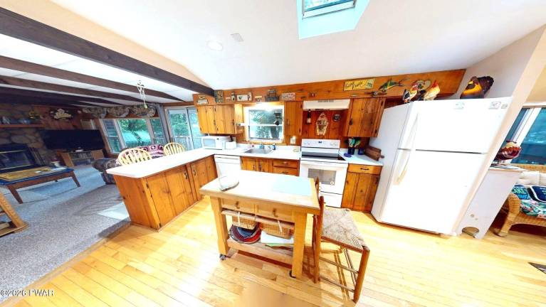 Enjoy water views from this well-maintained affordable lakefront