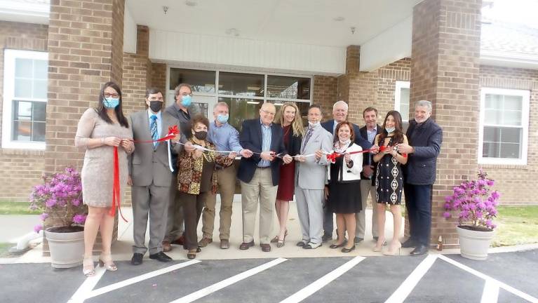 Pike County Development Director Mike Sullivan cut the ribbon, and everyone cheered (Photo by Frances Ruth Harris)