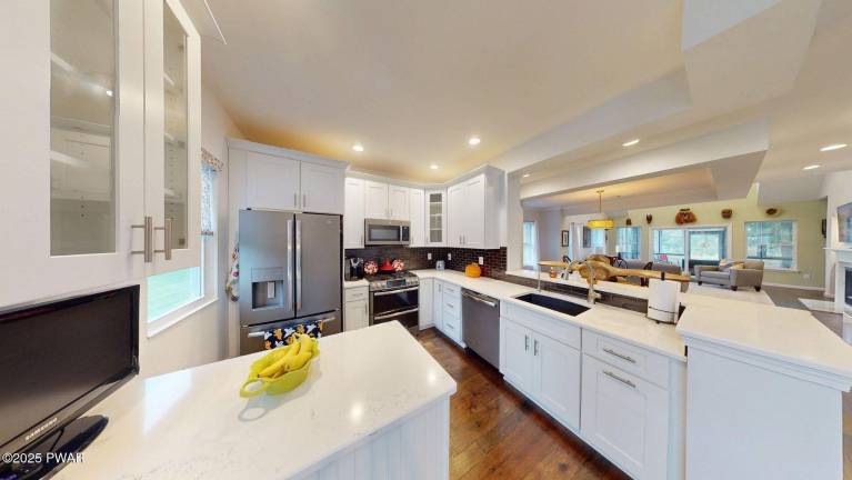 Enjoy river views and luxury living in this upscale townhome