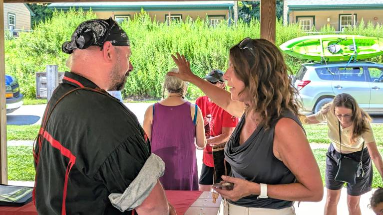 Lenape Chief Adam DePaul speaks with State Rep. Tarah Probst.