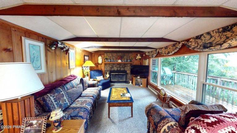 Enjoy water views from this well-maintained affordable lakefront