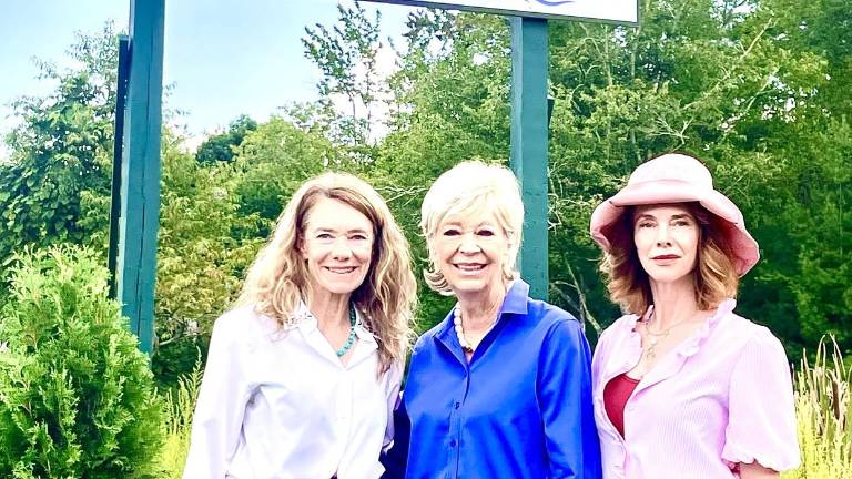 Pictured from left in front of the newly erected sign acknowledging the property donation are Tamara Chant, Judy Chant and Holley Chant.