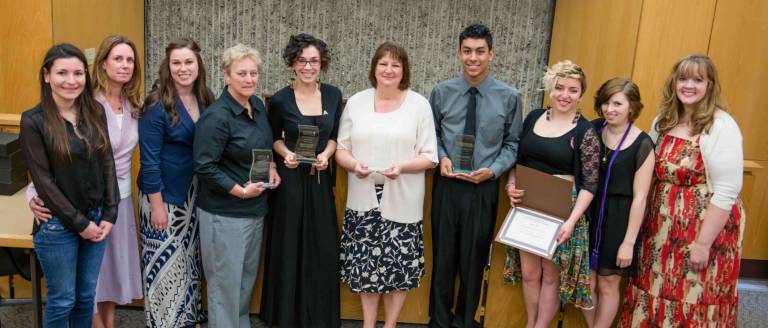 The East Stroudsburg University Women’s Studies Program and Feminist Alliance held its annual recognition ceremony in the University Center Senate Chambers on May 3 to honor the best students and the best advocates for activism related to women and gender issues. Honorees (from left): Hayley Miller (Iota Iota Iota inductee), Shannon Frystak, Ph.D., associate professor of history and women's studies faculty member), Lauren Gilborges (Iota Iota Iota inductee), Nancy Jo Greenawalt, assistant professor for intercollegiate athletics (Faculty Woman of Distinction), Felicia Revero (Student Woman of Distinction), Maureen Madden (Community Woman of Distinction), Nico Ramirez (Pro-Feminist Man of Distinction), Emily Fox (Women's Studies Scholarship Recipient), Molly Carson (Iota Iota Iota Inductee and Women's Studies Scholarship Recipient), and Andrea McClanahan, Ph.D., associate professor and chair of the department of communication studies, interim director of women’s studies and adviser to the Feminist Alliance.