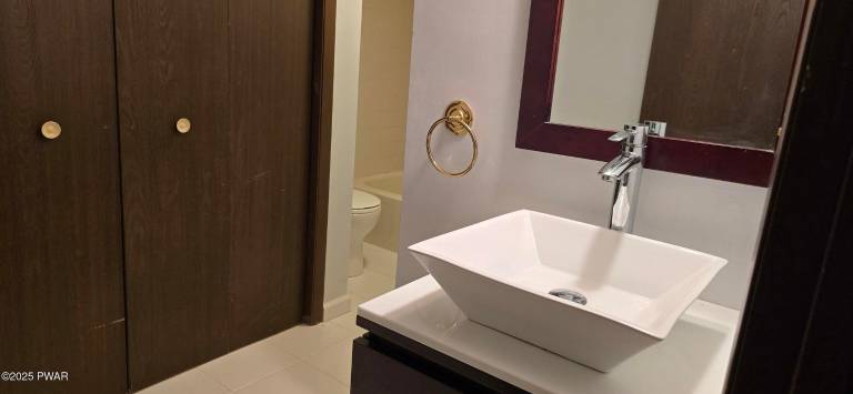 Enjoy water and woods from an historic lakefront home