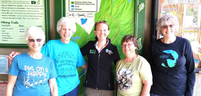 PEEC CEO Amanda Subjin with Girl Scout Camp Hidden Falls Leaders.