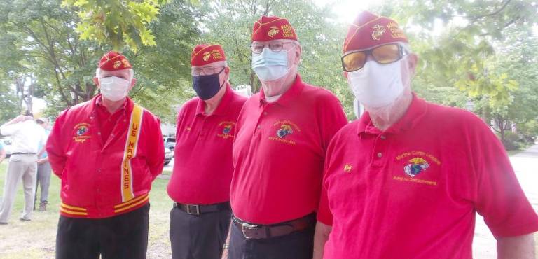 Gung Ho Detachment #909 of the U.S. Marine Corps League (from left): George Schmidt, Commander Gary Brink, Tim Parson, and Bugler Ray Patterson (Photo by Frances Ruth Harris)