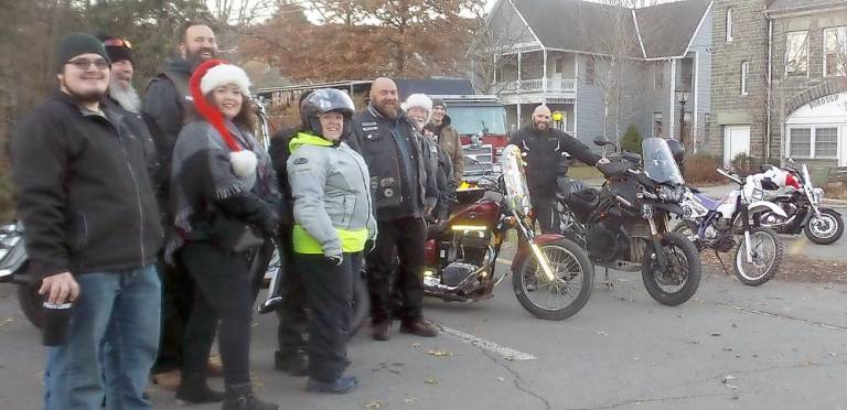 Bikers escorted Santa on his tour around Milford. (Photo by Frances Ruth Harris)