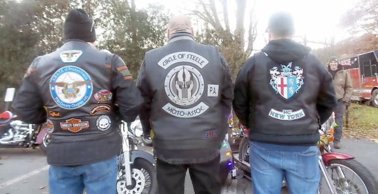 A.B.A.T.E. members all belong to other biker groups as well. They escorted Santa on his appointed rounds around Milford. (Photo by Frances Ruth Harris)