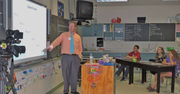 News Anchor Jim Hamill with students Darius Bermudez, Mellody Bookey, and Cheyenne Fernandez (Photo provided)