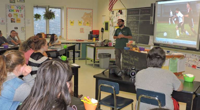 Photographer Christopher Victor with students Hope Jaeger, Laina Bogusta, Cyan Vazquez, and Kylee Doss (Photo provided)