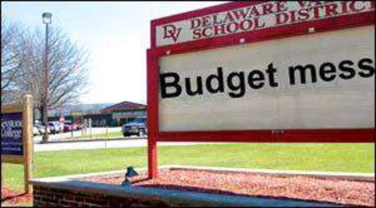 DV faces tax hike, program cuts