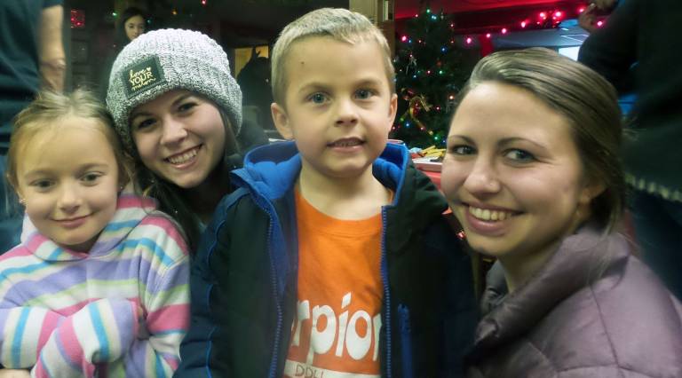 Kaelyn Redmond, Danielle Cawley, Carter Redmond, and Sarah Cawley enjoyed the party (Photo by Frances Ruth Harris)