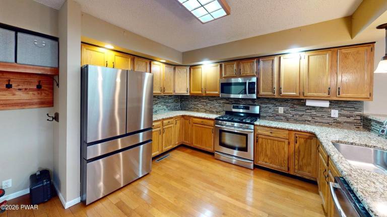 Enjoy a worry-free lifestyle in this three-bedroom townhome