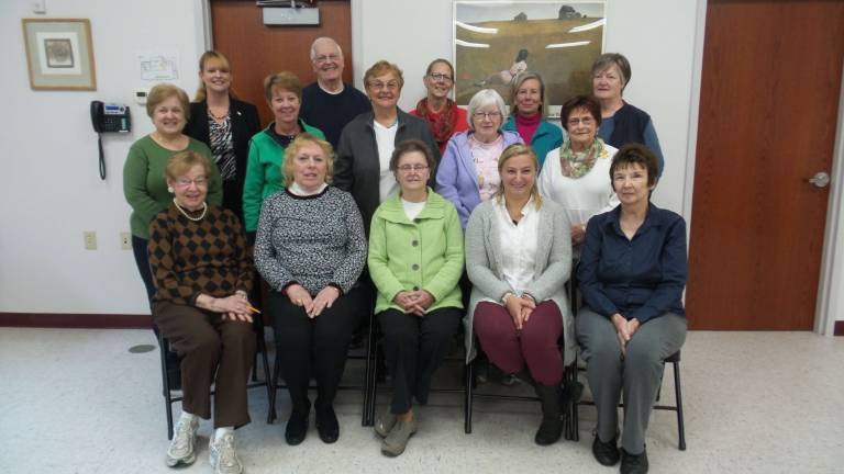 Friends of the Library who attending the annual meeting were, from left to right, Last row: Kelly Gaughan Marty Zuckerman; Pam DeMeis, Dingman Library's branch manager; Laurette Bachert; and Nancy Halliday. Middle row: Nancy Castanza, Nancy Babcock, Joyce Clark, Linda Ryder and Annie Catalano. First row, seated: Joan Gerland; Peggy Crook; Friends' president Marcy Linngsto; Rose Ciocci, director of the Pike County Library; and Elspeth Coodin.