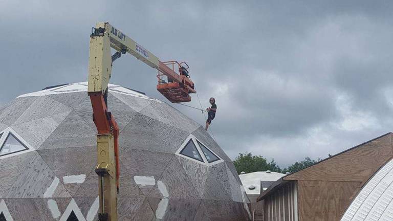 Work on the Center for Harmony roof earlier this month at HYPERLINK "https://www.facebook.com/havenforhumanity/?ref=stream"Haven for Humanity (Haven for Humanity Facebook page)