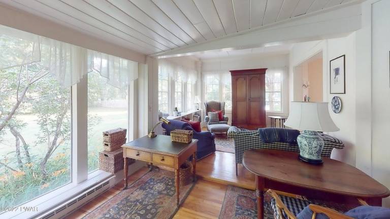 Prominent 4-bedroom Dutch colonial in the heart of Milford has it all