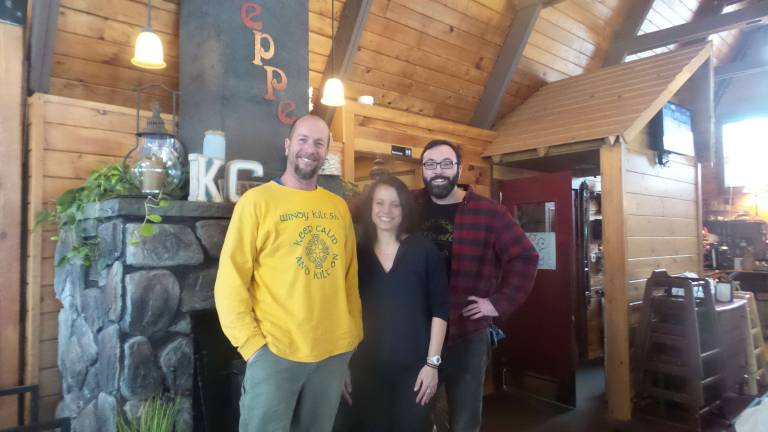 Gerald Margraf, &#x201c;Mr. January,&#x201d; founder of the Wayne County Heroin Prevention Task Force, is pictured with Katie Rossini and one of the two hunks featured in December (Photo by Frances Ruth Harris)