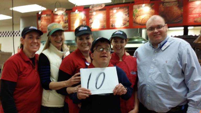 Celebrating Dennis Ohl&#x2019;s 10th anniversary at Price Chopper in Matamoras are (from left): Deborah Hete, Donna Ciancitto (job coach), Corinna Foster, Dennis Huculiak, Brandi Babcock, and store manger Paul Tinker (Photo provided)
