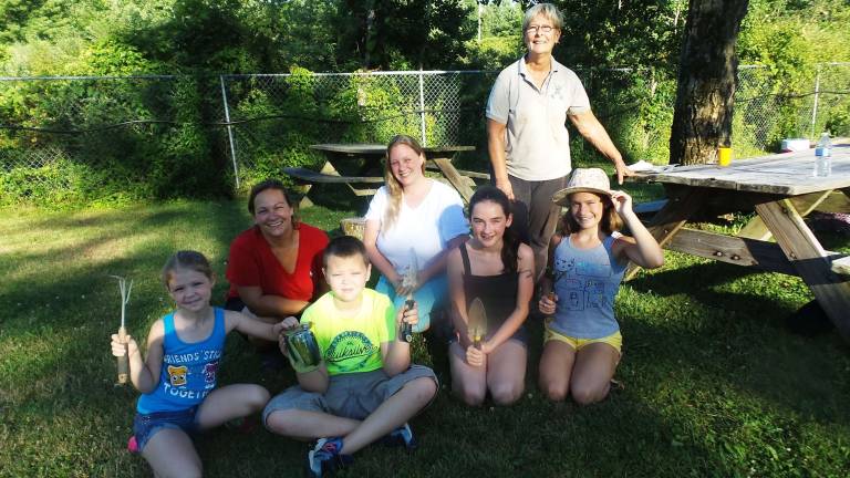 Discussing the upcoming Autumn Harvest Festival at Camp Akmack, back row (from left): Payton Fitzpatrick, Master Gardener Angela Williams, Corrine Fitzpatrick, and Carol Padalino; Front: Aidan Fitzpatrick, Ava Nienstadt and Hannah Williams (Photo by Frances Ruth Harris)