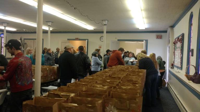 Helping hands and heaping plates