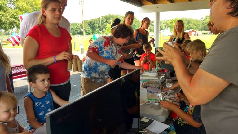 Folks shared how to make your own pinhole projector out of everyday materials.