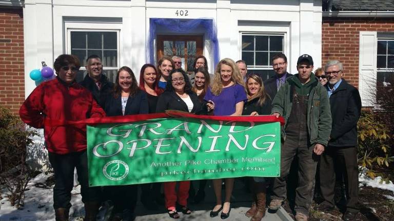Ribbon cutting at Safe Haven's new headquarters (Photo by Anya Tikka)