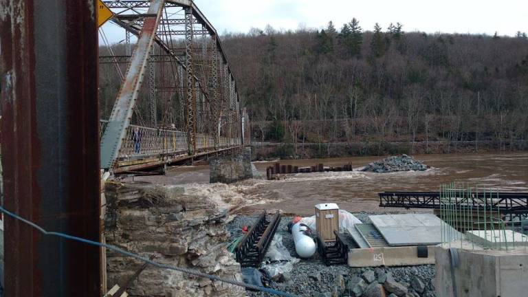 View of the flooding from the other side of the bridge where the construction is taking place. (Photo by Anya Tikka)