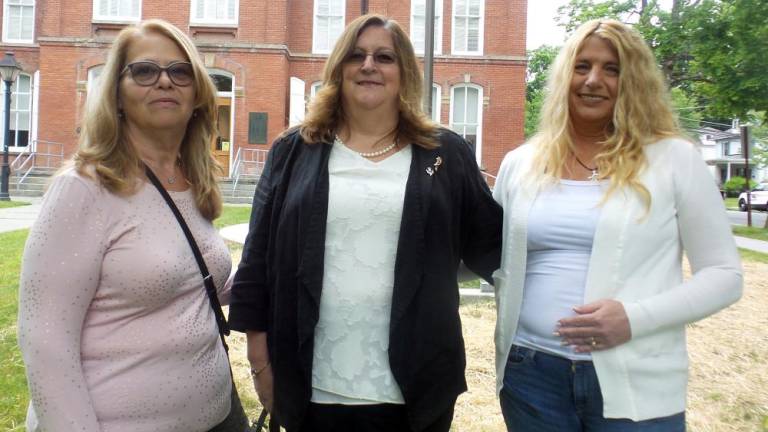 Friends of John Curwood came to support him during his sentencing hearing. Martha J. Lester (left) is pictured with Curwood's daughters Joy McCann (center) and June Heffernan (Photo by Frances Ruth Harris)
