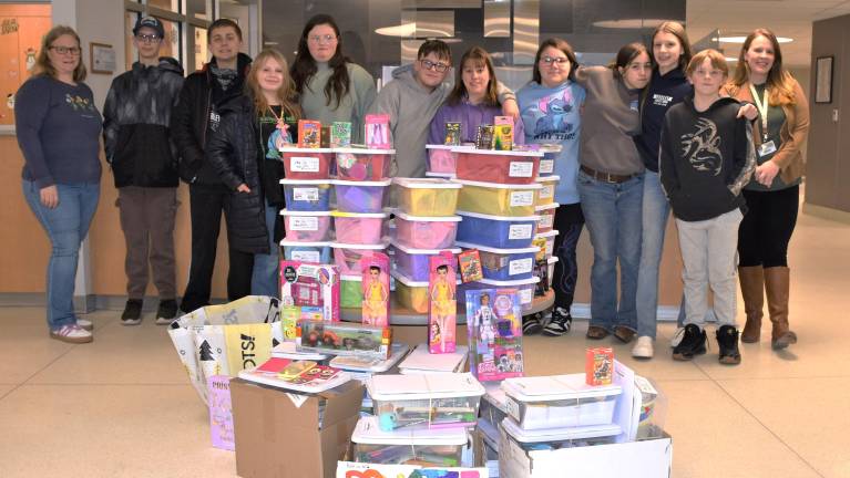 Wayne Highlands 6-8 graders, Jessica Kjera, youth programs and pop-up club coordinator at The Cooperage Project, (center) ,WMH Cashier Heather Gustafson, and Wayne Memorial Hospitals Human Resources Generalist Courtney Eichensehr<b>.</b>