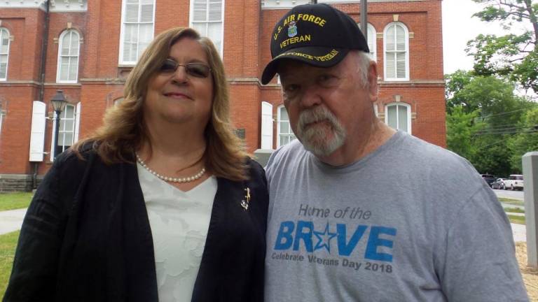 Joy McCann with her father's friend Bill Haughney, who served with John Curwood in the Air Force and has known him since 1959. Haughney drove up from Quakertown, Pa., for the sentencing hearing (Photo by Frances Ruth Harris)