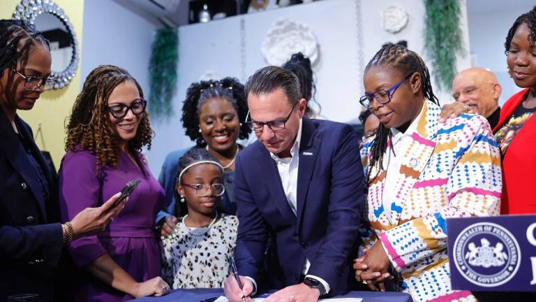 Governor Josh Shapiro joins elected officials and local business owners to sign House Bill 439 into law, officially prohibiting discrimination based on a persons hair type, hair texture, or hairstyle in Pennsylvania.
