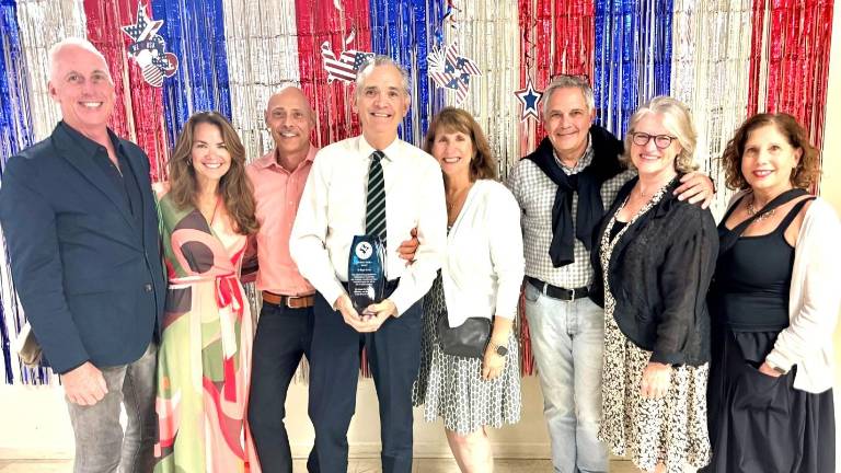 L to R: Doug Manion, Megan Strub, Javier Morales, Mayor Sean Strub, PCDC Chair Lisa Miller, Phila DA Larry Krasner, Lisa Rau, and Ronda Goldfein.