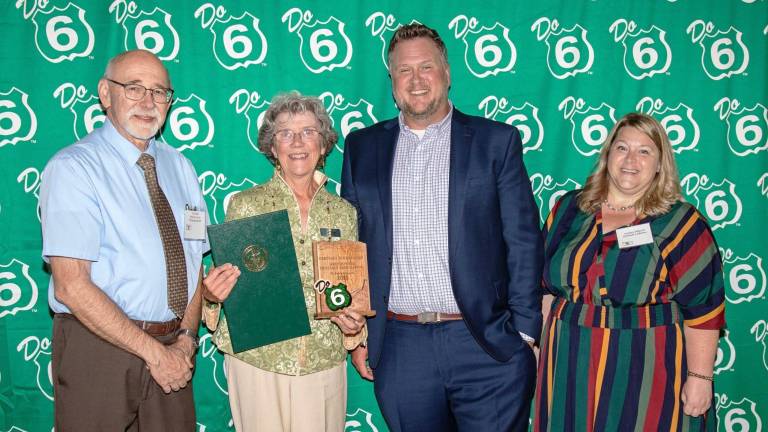 Linda Pinto of Grey Towers Heritage Association (second from left) accepts the “Do 6” Partnership Award from PA Route 6 Alliance Board President Dan Glotz, James Hamill of the Pocono Mountains Visitors Bureau, and PA Route 6 Alliance Executive Director Candace Hillyard.