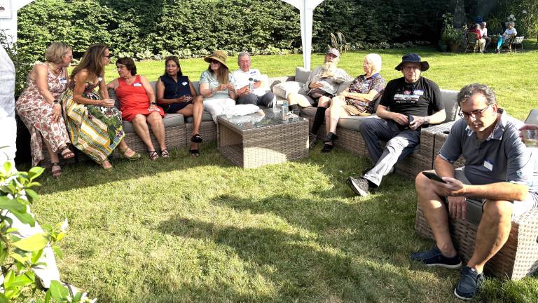 Some of the Pike Opera supporters sitting under the tent waiting for the speeches to begin.