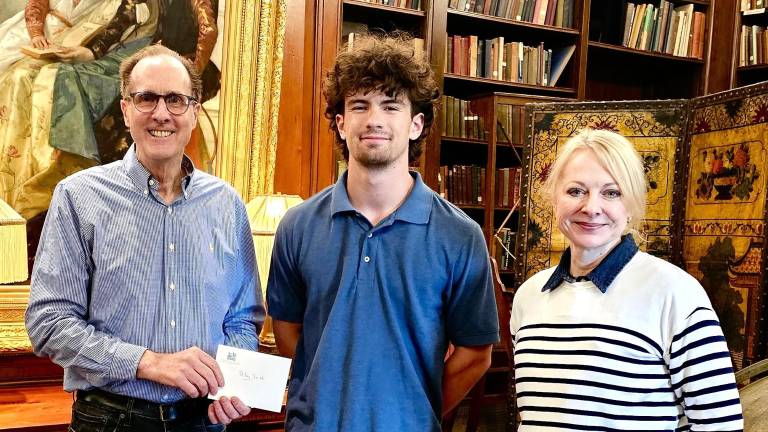Riley Smith from Delaware Valley High School (center) receives the Pinchot Legacy Scholarship.
